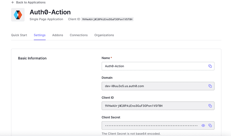 Auth0 application settings page showing domain and client ID values