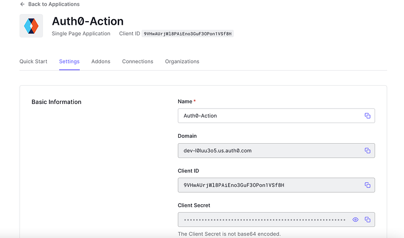 Auth0 application settings page showing domain and client ID values