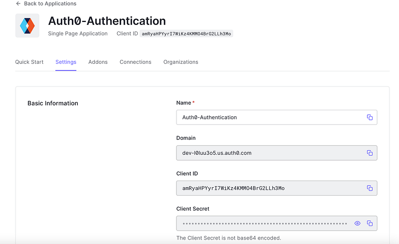 Auth0 application settings page showing domain and client ID details